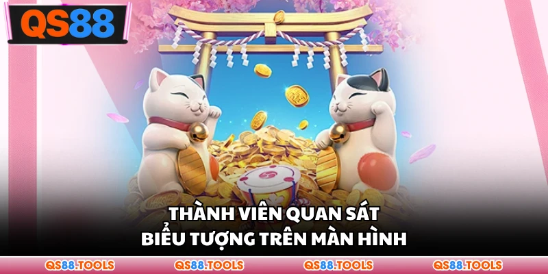 Nổ Hũ Mèo Thần Tài - Dòng Trò Chơi Được Nhắc Đến Nhiều 2 Thành viên quan sát biểu tượng trên màn hình